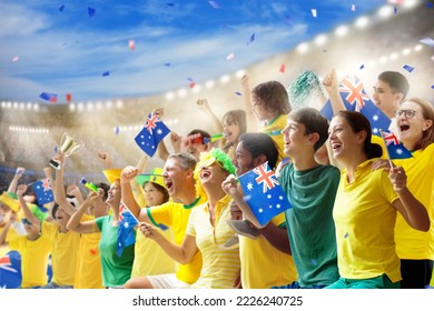 Australia fans on stadium. Australian supporters. Crowd cheering for Aussie football or cricket team victory. Soccer match on outdoor pitch. Patriotic party with national flag and jersey. - Powered by Shutterstock