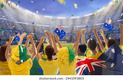 Australia fans on stadium. Australian supporters. Crowd cheering for Aussie football or cricket team victory. Soccer match on outdoor pitch. Patriotic party with national flag and jersey. - Powered by Shutterstock