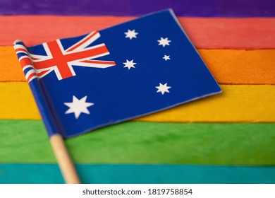 Australia Flag On Rainbow Background Symbol Of LGBT Gay Pride Month  Social Movement Rainbow Flag Is A Symbol Of Lesbian, Gay, Bisexual, Transgender, Human Rights, Tolerance And Peace.