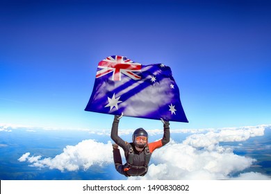 Australia. Flag In Skydiving. People In Free Fall Grab Flag Of Australia. Patriotism, Men And Flag.