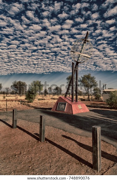 in  australia  the monument of the tropic of\
capricorn and clouds