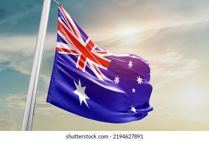 Australia national flag waving in beautiful clouds. - Shutterstock ID 2194627891