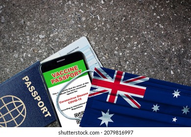 Australia New Normal Travel With Passport, Digital Vaccine On Smartphone, Boarding Pass And Face Mask With Australian Flag. Vaccine Passport Concept With Copy Space.