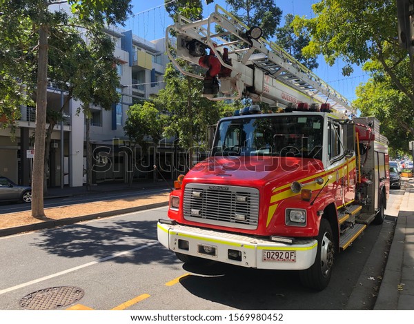 Australia - November 25 2019: Freightliner Fire\
truck belonging to the Queensland Fire and Rescue Department parked\
on the streets of\
Brisbane