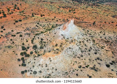 Australia, NT, Aerial View Of Chambers Pillar Historical Reserve With Window Rock And Chambers Pillar Road With Camping Ground In Outback Of Northern Territory