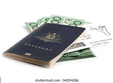 Australia Passport And 100 Dollar Banknotes With Boarding Pass For Travelling On White Background