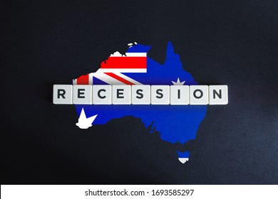 Australia Recession And Economic Crisis Due To Coronavirus Or Covid-19 Outbreak. Australian Flag And Map On Black Background.