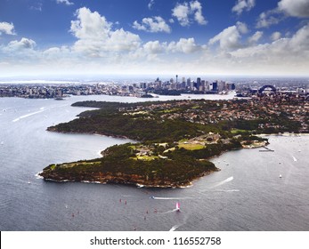 Australia Sydney Aerial View Over Harbour, Middle Head Towards City CBD And Harbour Bridge Sunny Day