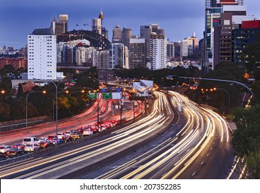 Australia Sydney City CBD Close Up View Along Cahill Express Motor Way Rush Hour With Car Congestions And Blurred Headlights 