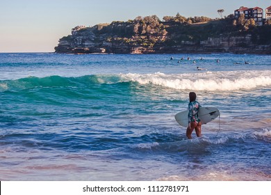 Australia Sydney Girl Surfing At Bondi Beach
