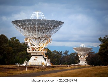 The Australia Telescope Compact Array (ATCA), at the Paul Wild Observatory. These are two of the six 22 metre antennas used for radio astronomy.
