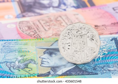 Australian 50 Cent Coin Stand On Dollar Banknote Money