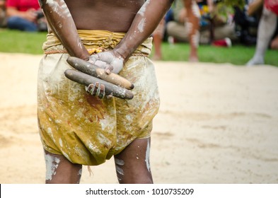Australian Aboriginal People Holding Traditional Wood Claves Percussion Instruments.