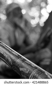 Australian Aboriginal People Playing Aboriginal Music On Didgeridoo And Wooden Local Instruments In The Tropical Far North Of Queensland, Australia.