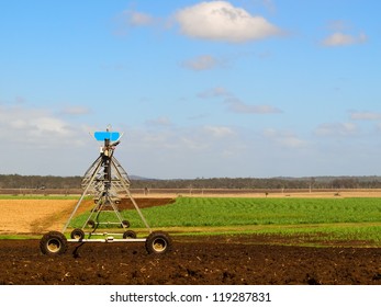 Australian Agriculture Ploughed sugarcane field with irrigation equipment rural landscape scene