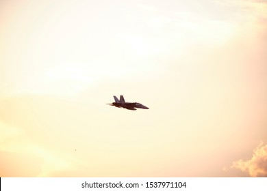 Australian Air Force Fighter Jet Flying Through Brisbane At Sunset