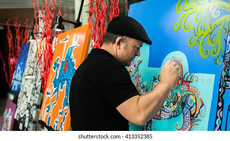 Australian Artist Des Spencer Applies Detail To One Of His Oil Painting Works At An Exhibition Of His Art At The Jumeirah Creekside Hotel In Dubai, United Arab Emirates.