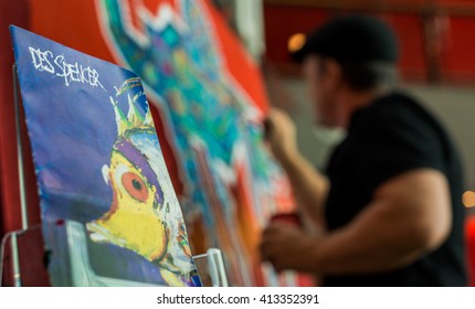 Australian Artist Des Spencer Applies Detail To One Of His Oil Painting Works At An Exhibition Of His Art At The Jumeirah Creekside Hotel In Dubai, United Arab Emirates.