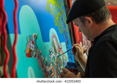 Australian Artist Des Spencer Applies Detail To One Of His Oil Painting Works At An Exhibition Of His Art At The Jumeirah Creekside Hotel In Dubai, United Arab Emirates.