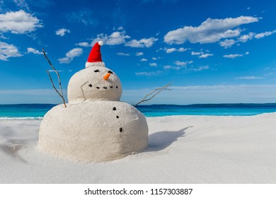 Australian Christmas Sandman On A Beautiful White Sand Beach