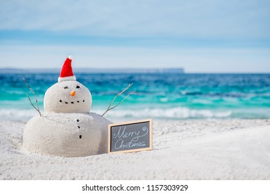 Australian Christmas Sandman On A Beautiful White Sand Beach