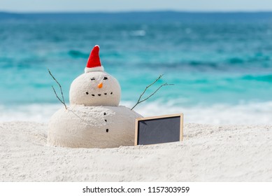 Australian Christmas Sandman On A Beautiful White Sand Beach