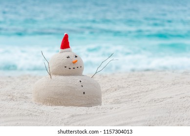 Australian Christmas Sandman On A Beautiful White Sand Beach