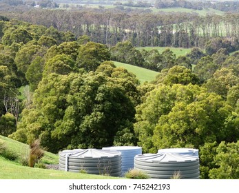 Australian country view with farm tanks in the foreground