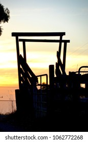 Australian Farm Gate Sheep Ramp At Sunset With Retro Wooden Structure 