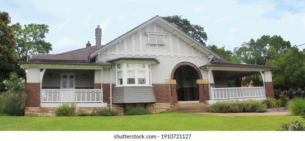 Australian Federation Style Brick House. The Home Features Verandahs And Bay Window
