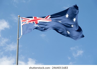 Australian flag against blue sky. High quality photo. - Powered by Shutterstock