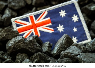 Australian Flag On The Background Of Coal, Concept Of Coal Mining And Extraction In Australia, Rising Commodity Prices In The World, Environmental Impact, Industry And The Economy Of The Country