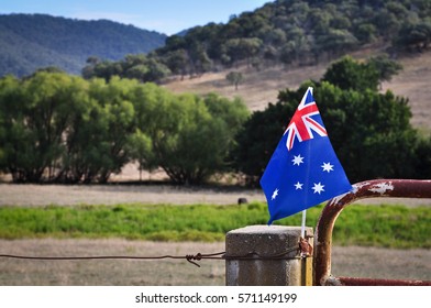 Australian flag on farm fence post in Australia