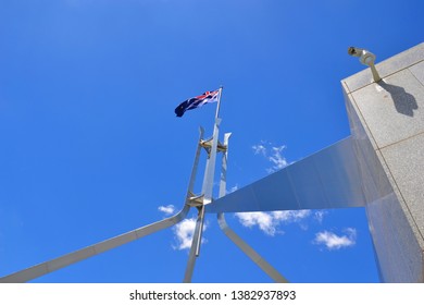 Australian Flag On Parliament House With Surveillance Camera.