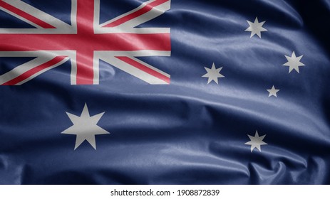 Australian flag waving in the wind. Close up of Australia banner blowing, soft and smooth silk. Cloth fabric texture ensign background. Use it for national day and country occasions concept. - Powered by Shutterstock