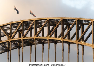 The Australian Flags Flying On The Top Of The Sydney Harbour Bridge