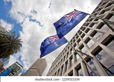 Australian Flags Waving On The Government Building At The Number One Of Treasury Place, East Melbourne, Victoria, Australia.