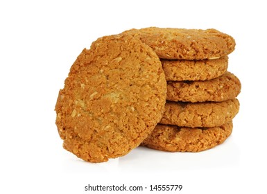 Australian Icon - Anzac Biscuits, Isolated On White.  Made From Rolled Oats, Coconut, Treacle, Butter And Sugar.  Delicious!