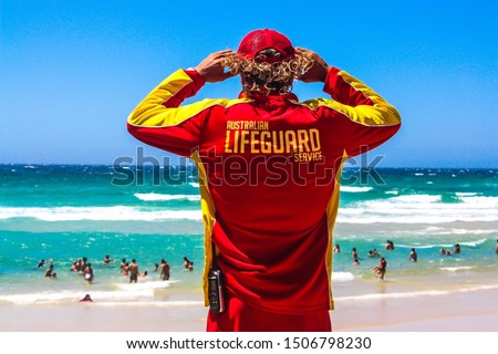 Australian lifeguard at the beach in style