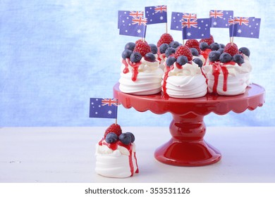 Australian mini pavlovas and flags in red, white and blue for Australia Day or national holiday party food treats. 