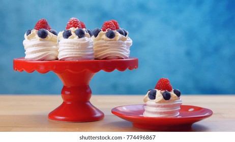 Australian Mini Pavlovas And Flags In Red, White And Blue For Australia Day Or National Holiday Party Food Treats.