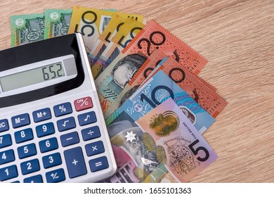 Australian Money Aud With Calculator On Desk.