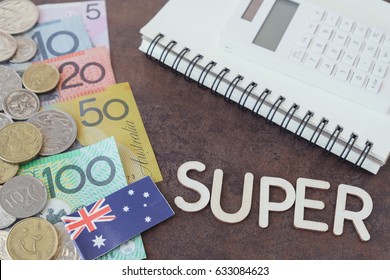 Australian money, AUD with SUPER word, calculator, and notebook 