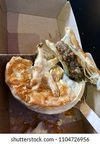 An Australian Or New Zealand Meat Pie Is A Hand-sized Meat Pie Containing Diced Or Minced Meat And Gravy, Sometimes With Onion, Mushrooms, Or Cheese And Often Consumed As A Takeaway Food Snack.