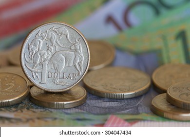 Australian One Dollar Coin And Bank Notes