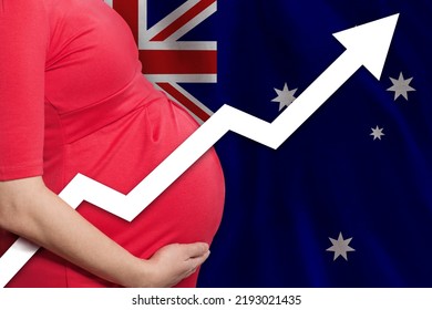 Australian Pregnant Woman On Flag Of Australia Background. Birth Rate Up