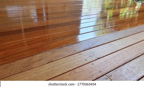 Australian spotted gum deck being stained for the first time