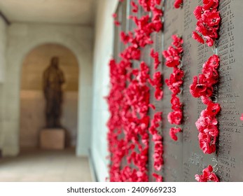 Australian War Memorial with red poppies in names of fallen in Canberra Australia ANZAC memorial