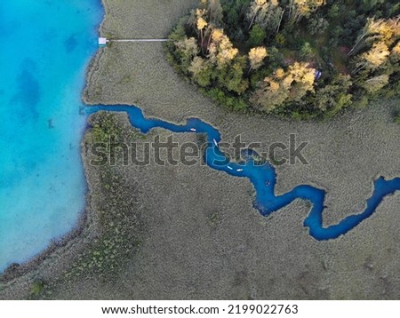 Similar – Image, Stock Photo I see a lake with dramatic clouds and trees reflected in the water