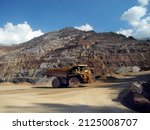 Austria, Erzberg - surface mining of iron ore in Styria, irrigation against dust development with heavy load truck